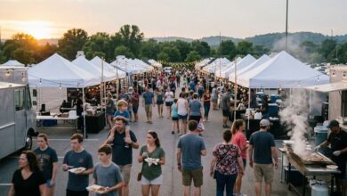 Crowds walking between food trucks and vendor tents at an outdoor evening food festival in Middle Tennessee (illustrative)
