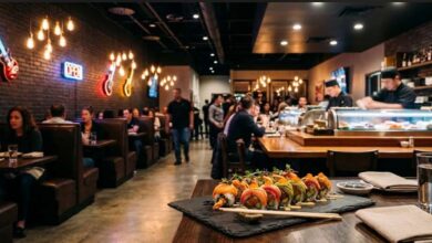 Interior of a new casual sushi restaurant with leather booths, neon guitar decor and a sushi counter (illustrative)