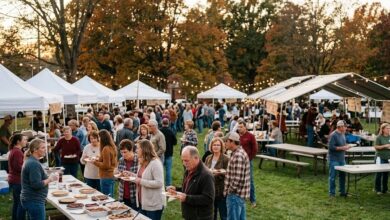 Neighbors sampling pies and chili under white tents at an autumn evening food festival (illustrative)